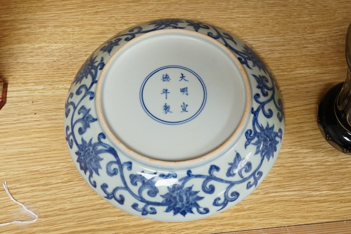 A Chinese blue and white dish, Xuande mark but later, 22cm in diameter